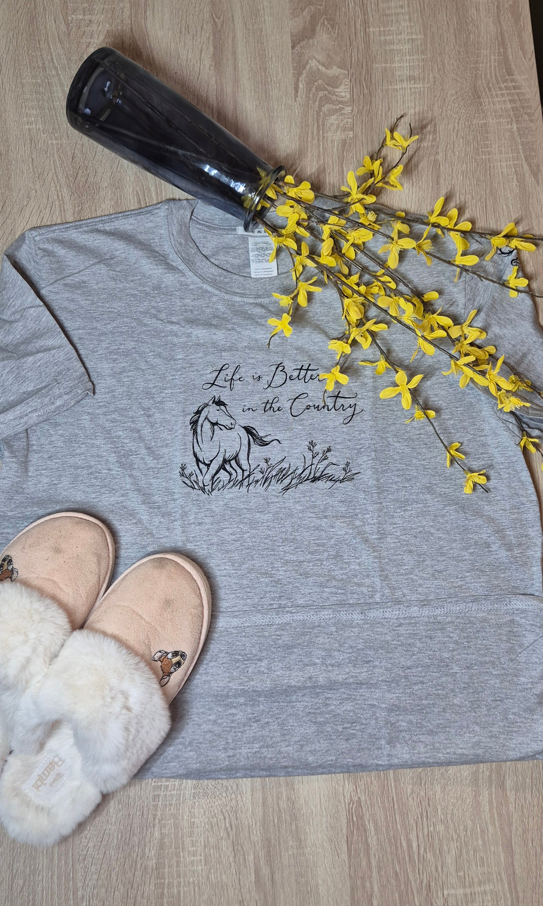 Gray sweatshirt with horse graphic and text