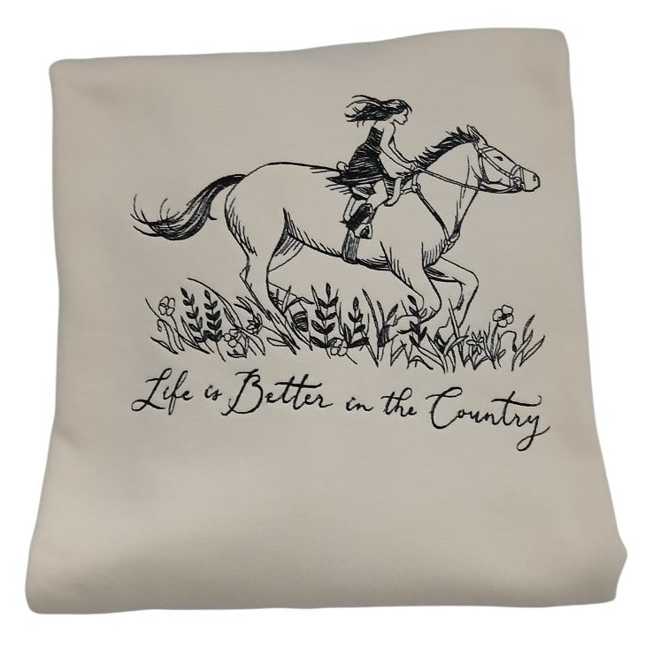 Sweatshirt with embroidered horse and rider