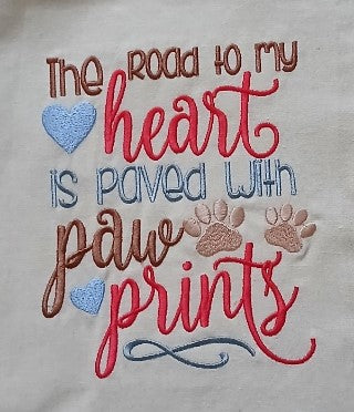 Bag for life with "The road to my heart is paved with paw prints" embroidery